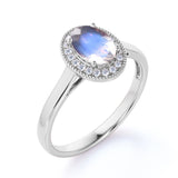 Massive 1.25 Carat Oval Dark Blue Moonstone and Diamond Halo Engagement Ring in Rose Gold