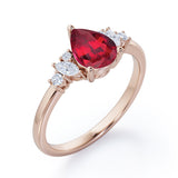 Fashionable 7 Stones 0.6 carat Pear Lab-Created Ruby and Diamond Engagement Ring in White Gold