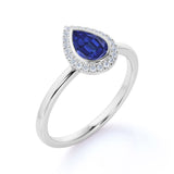 Minimalist 1.20 Carat Pear cut Lab-Created Sapphire and Diamond Halo Engagement Ring in White Gold
