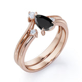 1 carat tear drop cut Black Diamond V shaped wedding ring set in white gold