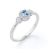 Double Hearts 1.15 Carat Round Cut Aquamarine And Diamond Halo Engagement Ring In White Gold