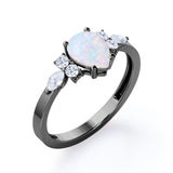 Four Prong Basket Set 1.35 Carat Pear Cut Ethiopian Opal And Diamond Seven Stone Engagement Ring In White Gold