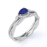 Milgrain Three Stone Bezel Set 2 Carat Pear Cut Sapphire and Diamond Wedding Set with Infinity Band in White Gold