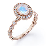 Antique Art Deco 1.35 Carat Oval Cut Moonstone And Diamond Halo Engagement Ring In White Gold