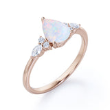 Affordable 1.35 Carat Tear Drop White Opal And Diamond  Seven Stone Engagement Ring In White Gold.