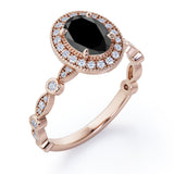 Antique Art Deco 1.35 Carat Oval Cut Black Diamond Halo Engagement Ring In Black Gold