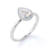 Classic 1.25 Carat Pear Shape Rainbow Moonstone and Diamond Halo Engagement Ring in Rose Gold