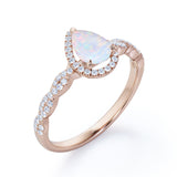 Twisted 1.45 Ct Pear Cut Lab Created Opal Engagement Ring