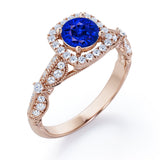 Antique Milgrain 1.35 Carat Round Cut Sapphire And Diamond Halo Engagement Ring In Rose Gold