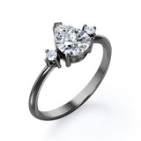 Minimalist Three Stone 0.55 carat Pear Moissanite and Diamond Engagement Ring in Rose Gold