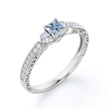 1.10 Carat Princess Cut Aquamarine And Diamond Channel Set Engagement Ring In White Gold