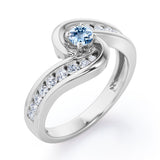 Spinning 0.7 carat Round Aquamarine and Moissanite Channel Engagement Ring in White Gold
