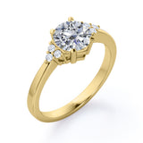 Tapered Classic 0.55 carat Round Moissanite and Diamond Engagement Ring in White Gold