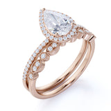 1.75 Carat pear cut Moissanite and Diamond Wedding Ring Set in 10k Rose Gold