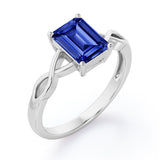 Solitaire 1 Carat Lab-Created Emerald Cut Sapphire Infinity Engagement Ring In White Gold