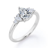 Fashionable 7 Stones 0.6 carat Pear Moissanite and Diamond Engagement Ring in Rose Gold