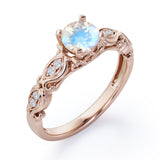 Decorative Basket Prong 0.5 carat Round Moonstone and Diamond Nature-Inspired Ring in Rose Gold