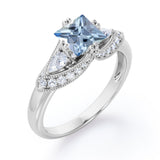 Vintage Eight Prongs 1.30 Carat Princess Cut Aquamarine And Diamond Marquise Framed Beaded Engagement Ring In White Gold