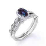 Vintage Hidden Halo 1.75 Carat Oval Cut Lab Alexandrite and Diamond Art Deco Bridal Set Rings