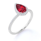 Elegant Pave 1.50 Carat Pear Shape Lab Ruby and Diamond Halo Engagement Ring in White Gold