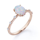 Sharp Four Claws 1.10 Carat Oval Cut Fire Opal And Diamond Seven Stone Engagement Ring In White Gold