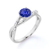 Infinity Inspired 1.25 Carat Round Cut Sapphire and Diamond Engagement Ring in White Gold