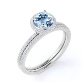 Antique Style 1.75 Carat Round Brilliant Cut Aquamarine and Diamond Halo Bridal Ring set in White Gold