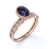 Classic Bezel Set 1.50 Carat Oval Cut Lab Created Alexandrite and Diamond Art Deco Bridal Set Rings