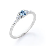 Modern 4 Prong 1.25 Carat Round Cut Genuine Vivid Blue Aquamarine and Diamond Cluster Engagement Ring