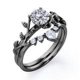 Fairytale 0.55 carat Round Moissanite and Diamond Wedding Ring Set in Black Gold