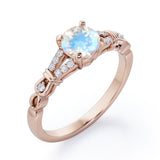 Split Shank 0.6 carat Round Moonstone and Diamond Engagement Ring in Rose Gold