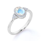Vintage 1.50 Carat Oval Cut Blue Moonstone and Diamond Halo Engagement Ring in White Gold