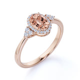 Four Prong 1.15 Carat Oval Cut Morganite and Six Stone Diamond Engagement Ring in Rose Gold