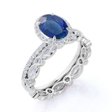 Eternity Micro Pave 2 Carat Oval Cut Sapphire and Diamond Halo Bridal Set in White Gold