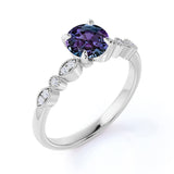 Four Claw 1.25 Carat Round Cut Lab Grown Alexandrite and Diamond Art Deco Solitaire Engagement Ring