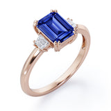 Eight Prongs 1.10 Carat Emerald Cut Sapphire And Diamond Three Stone Engagement Ring In Rose Gold