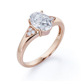 Tapered Shank 7 Stone 1.35 Carat Oval Cut Moissanite and Diamond Prong Basket Engagement Ring in White Gold