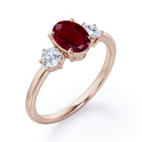 Trio 0.80 ct Oval Lab-Created Ruby Engagement Ring