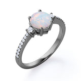 Hexagon Set 1.35 Carat Brilliant Round Ethiopian Opal And Diamond Pave Engagement Ring In White Gold.