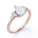 Seven Stone 0.6 Ct Pear Cut Lab Created Opal Engagement Ring