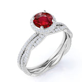 Stylish Infinity Halo Design 1.25 Carat Round Cut Lab Ruby and Diamond Wedding Ring Set in White Gold