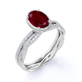 Stylish Infinity Design 1.50 Carat Oval Cut Lab Ruby and Diamond Bezel Wedding Ring Set in White Gold