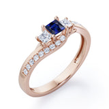 Trellis Three Stones 1 carat Princess Blue Sapphire and Moissanites Braided Engagement Ring in White Gold