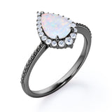 Vintage Inspired 1.35 Carat Tear Drop Fiery White Opal And Diamond Halo Engagement Ring In White Gold