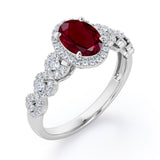 Twisted 1.45 Carat Oval Cut Lab Ruby And Diamond Halo Engagement Ring In White Gold