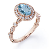 Vintage Halo 1.35 Carat Oval Cut Aquamarine And Diamond Art Deco Engagement Ring In Rose Gold