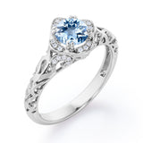 Modern Art Deco 1.10 Carat Round Cut Aquamarine And Diamond Cushion Framed Halo Engagement Ring In Rose Gold