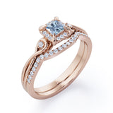 Cushion Halo Prong - 0.85 TCW Princess Cut Aquamarine and Moissanite - Infinity Split Shank Wedding Ring Set -  Rose Gold
