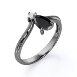 1 carat tear drop cut Black Diamond V shaped style engagement ring in white gold