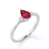 1.25 Carat Pear Shape Lab Ruby and Eight-Stone Diamond Engagement Ring in White Gold